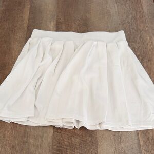Women's White Mini Skirt - Flowy Pleated Style